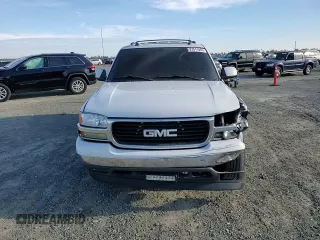 2005 GMC Yukon SLT z VIN 1GKEC13T75R205508, wystawiony jako Copart lot #87511845 z przebiegiem 179 749 mil mil oraz Szkoda całkowita • Salvage title. Historia ofert i sprzedaży dostępna na DreamBid. Obrazek 12.
