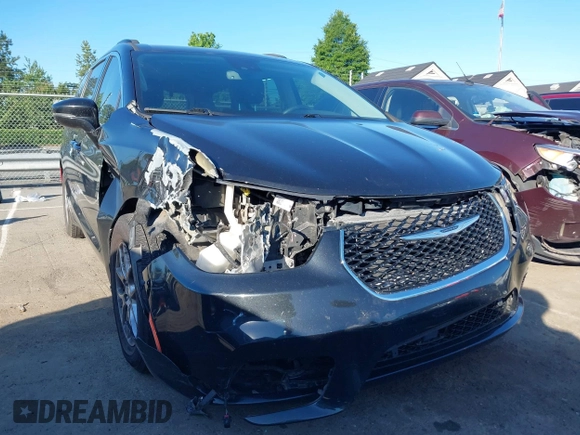 2022 Chrysler Pacifica Touring L with VIN 2C4RC1BG9NR117538, listed as a IAAI auction lot 42318518 with 103,311 mi miles and . Bid and sale history available at DreamBid. Image 6.
