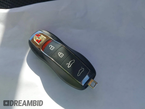2015 Porsche Cayman with VIN WP0AA2A86FK163282, listed as a IAAI auction lot 42001118 with 101,495 mi miles and . Bid and sale history available at DreamBid. Image 11.