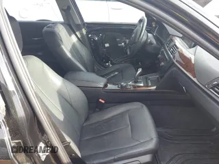 2014 BMW 3 Series 328i with VIN WBA3A5C56EF606175, listed as a IAAI auction lot 42211614 with 152,783 mi miles and . Bid and sale history available at DreamBid. Image 5.