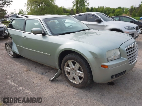 2006 Chrysler 300 Touring z VIN 2C3KK53G06H242398, wystawiony jako IAAI lot #42404803 z przebiegiem 163 947 mil mil oraz . Historia ofert i sprzedaży dostępna na DreamBid. Obrazek 1.