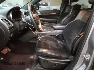 2017 Jeep Grand Cherokee Trailhawk with VIN 1C4RJFLG8HC618709, listed as a Copart auction lot 52899194 with 69,000 mi miles and Salvage title. Bid and sale history available at DreamBid. Image 7.