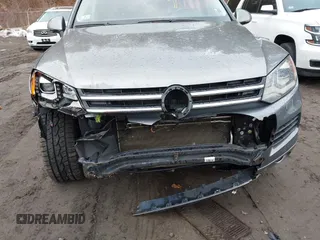 2013 Volkswagen Touareg Lux with VIN WVGEF9BP0DD005082, listed as a IAAI auction lot 41667026 with 140,148 mi miles and . Bid and sale history available at DreamBid. Image 6.