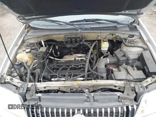 2005 Mercury Mariner Convenience z VIN 4M2YU57Z55DJ18600, wystawiony jako IAAI lot #42082068 z przebiegiem 141 530 mil mil oraz . Historia ofert i sprzedaży dostępna na DreamBid. Obrazek 10.