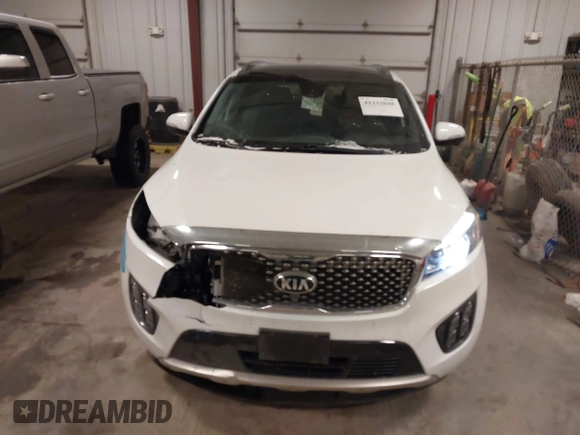 2018 Kia Sorento SX with VIN 5XYPKDA55JG388400, listed as a IAAI auction lot 41332048 with 70,153 mi miles and . Bid and sale history available at DreamBid. Image 13.