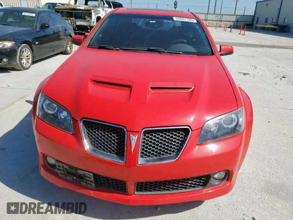 2009 Pontiac G8 z VIN 6G2ER57779L184240, wystawiony jako Copart lot #53801105 z przebiegiem 214 448 mil mil oraz Czysty tytuł • Clean title. Historia ofert i sprzedaży dostępna na DreamBid. Obrazek 5.