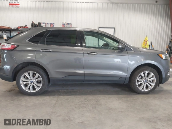 2022 Ford Edge Titanium with VIN 2FMPK4K96NBB06191, listed as a IAAI auction lot 42097951 with 50,792 mi miles. Bid and sale history available at carsss.com. Image 13.