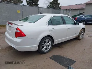 2012 Ford Fusion SE with VIN 3FAHP0HAXCR430866, listed as a IAAI auction lot 41676183 with 128,049 mi miles and . Bid and sale history available at DreamBid. Image 4.
