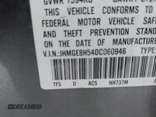 2013 Honda Fit Sport with VIN JHMGE8H54DC060946, listed as a IAAI auction lot 42095655 with 117,729 mi miles. Bid and sale history available at carsss.com. Image 9.