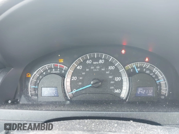 2014 Toyota Camry L with VIN 4T1BF1FK1EU758494, listed as a IAAI auction lot 42127661 with 242,112 mi miles. Bid and sale history available at carsss.com. Image 7.