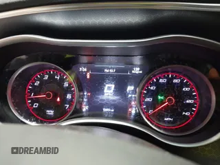 2015 Dodge Charger SXT with VIN 2C3CDXJG9FH785729, listed as a IAAI auction lot 41802261 with 145,974 mi miles. Bid and sale history available at carsss.com. Image 7.