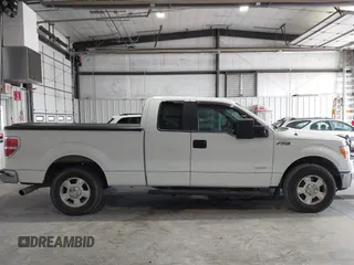 2011 Ford F-150 XL with VIN 1FTFX1CT9BFB10353, listed as a IAAI auction lot 42090388 with 469,657 mi miles. Bid and sale history available at carsss.com. Image 12.