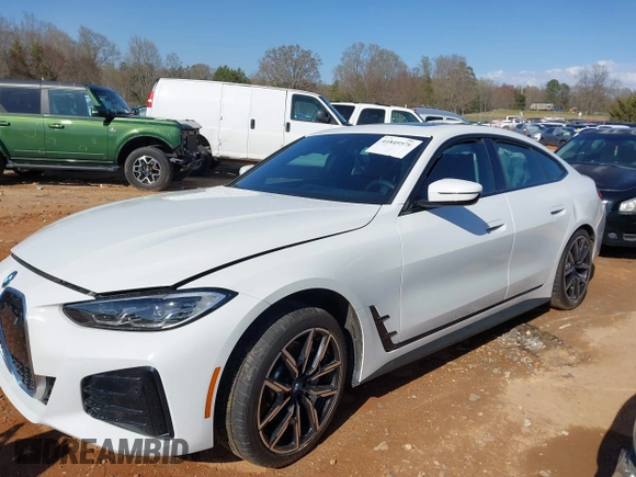 2023 BMW i4 eDrive40 z VIN WBY73AW08PFN72118, wystawiony jako IAAI lot #41849570 z przebiegiem 27 118 mil mil oraz . Historia ofert i sprzedaży dostępna na DreamBid. Obrazek 15.