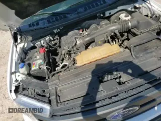 2018 Ford F-150 XL с VIN 1FTMF1CB1JKC33250, выставлен на аукционе Copart как лот 70648905 с пробегом 89 383 миль миль и Списание • Salvage title. История ставок и продаж доступна на DreamBid. Изображение 13.