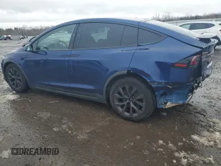 2023 Tesla Model X with VIN 7SAXCDE50PF430739, listed as a Copart auction lot 43069745 with 13,942 mi miles and Salvage Title. Bid and sale history available at DreamBid. Image 2.