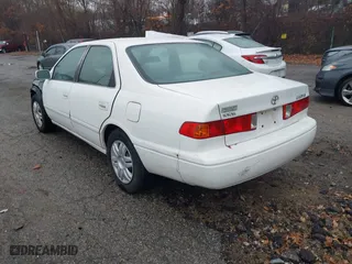 2000 Toyota Camry CE with VIN 4T1BG22K2YU976361, listed as a IAAI auction lot 38059387 with 153,541 mi miles. Bid and sale history available at carsss.com. Image 3.