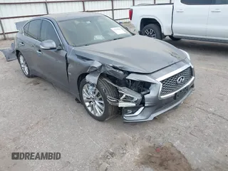 2019 Infiniti Q50 Luxe z VIN JN1EV7AP6KM518141, wystawiony jako IAAI lot #42299068 z przebiegiem 98 774 mil mil oraz . Historia ofert i sprzedaży dostępna na DreamBid. Obrazek 1.