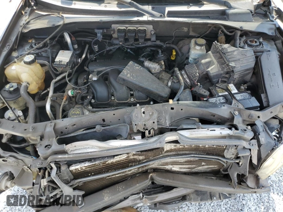 2006 Mazda Tribute S with VIN 4F2YZ06186KM08378, listed as a Copart auction lot 69391894 with Not Provided miles and Salvage Title. Bid and sale history available at DreamBid. Image 13.