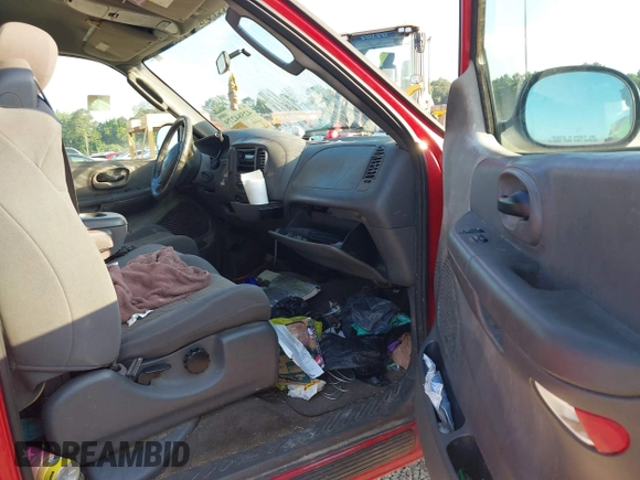 2003 Ford F-150 XL with VIN 1FTRX17W53NB27062, listed as a IAAI auction lot 42584279 with Not provided miles and . Bid and sale history available at DreamBid. Image 5.