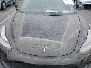 2019 Tesla Model 3 Mid Range with VIN 5YJ3E1EA2KF362048, listed as a IAAI auction lot 40141734 with 70,321 mi miles and . Bid and sale history available at carsss.com. Image 10.