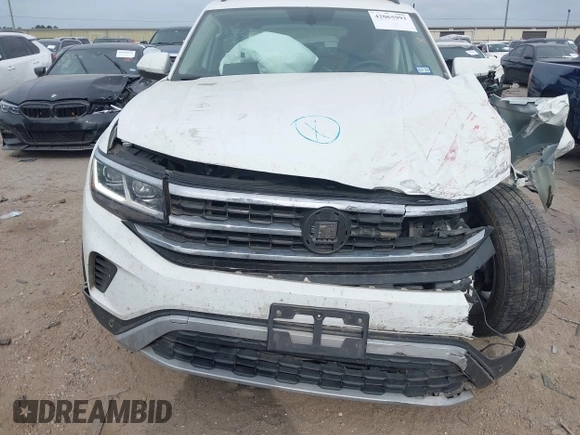 2021 Volkswagen Atlas SE with VIN 1V2WR2CA3MC570349, listed as a IAAI auction lot 42065993 with 83,362 mi miles and . Bid and sale history available at DreamBid. Image 12.
