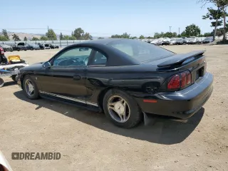 1997 Ford Mustang with VIN 1FALP4048VF172130, listed as a Copart auction lot 59790275 with 125,336 mi miles and Salvage title. Bid and sale history available at DreamBid. Image 2.