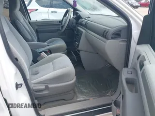 2006 Ford Freestar SE z VIN 2FMZA51616BA22838, wystawiony jako IAAI lot #42100454 z przebiegiem 185 433 mil mil oraz . Historia ofert i sprzedaży dostępna na DreamBid. Obrazek 5.