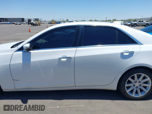 2015 Cadillac CTS Luxury RWD with VIN 1G6AR5SX7F0106703, listed as a IAAI auction lot 42607622 with 79,539 mi miles and . Bid and sale history available at DreamBid. Image 14.