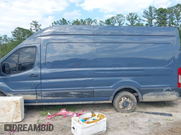 2019 Ford Transit z VIN 1FTYR3XMXKKB33312, wystawiony jako IAAI lot #42253712 z przebiegiem 68 590 mil mil oraz . Historia ofert i sprzedaży dostępna na DreamBid. Obrazek 14.