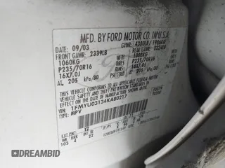 2004 Ford Escape XLT with VIN 1FMYU03134KA80217, listed as a IAAI auction lot 41672764 with 184,601 mi miles. Bid and sale history available at carsss.com. Image 9.
