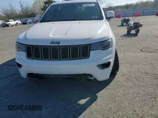 2016 Jeep Grand Cherokee Limited 75th Anniversary with VIN 1C4RJFBG3GC350068, listed as a Copart auction lot 52554675 with 109,985 mi miles and Salvage Title. Bid and sale history available at DreamBid. Image 10.