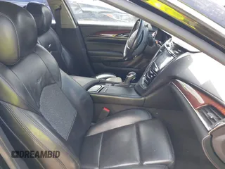 2014 Cadillac CTS Vsport RWD z VIN 1G6AU5S84E0149790, wystawiony jako IAAI lot #42369928 z przebiegiem 96 715 mil mil oraz . Historia ofert i sprzedaży dostępna na DreamBid. Obrazek 5.