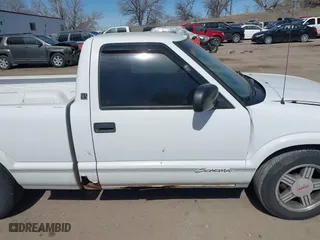 1998 GMC Sonoma with VIN 1GTCS1443W8543587, listed as a IAAI auction lot 41810870 with 164,342 mi miles. Bid and sale history available at carsss.com. Image 13.