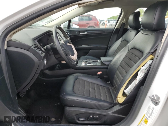 2018 Ford Fusion SE z VIN 3FA6P0LU5JR248594, wystawiony jako Copart lot #56056775 z przebiegiem Nie podano mil oraz Szkoda całkowita • Salvage title. Historia ofert i sprzedaży dostępna na DreamBid. Obrazek 7.