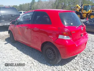 2011 Toyota Yaris with VIN JTDJT4K30B5332648, listed as a IAAI auction lot 41820350 with 216,482 mi miles. Bid and sale history available at carsss.com. Image 3.
