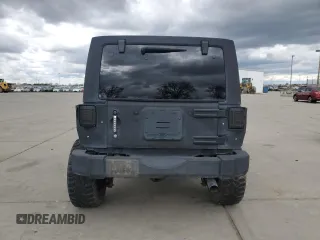 2015 Jeep Wrangler Unlimited Wrangler X with VIN 1C4HJWEG7FL649231, listed as a Copart auction lot 47972905 with 133,895 mi miles and Salvage title. Bid and sale history available at DreamBid. Image 6.