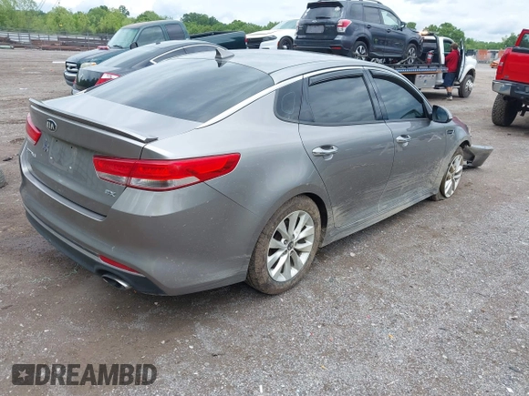 2017 Kia Optima EX with VIN 5XXGU4L34HG126243, listed as a IAAI auction lot 42180111 with 171,747 mi miles and . Bid and sale history available at DreamBid. Image 4.