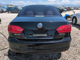 2013 Volkswagen Jetta SE with VIN 3VWDX7AJ8DM292073, listed as a Copart auction lot 59989585 with 129,697 mi miles and Salvage title. Bid and sale history available at DreamBid. Image 6.