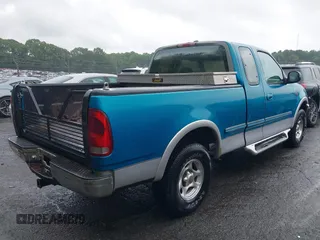 1997 Ford F-150 XL z VIN 1FTDX18W3VND39194, wystawiony jako IAAI lot #42653054 z przebiegiem 192 417 mil mil oraz . Historia ofert i sprzedaży dostępna na DreamBid. Obrazek 4.