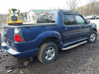2005 Ford Explorer Sport Trac XLS z VIN 1FMZU77K55UB60334, wystawiony jako IAAI lot #41984083 z przebiegiem Nie podano mil oraz . Historia ofert i sprzedaży dostępna na DreamBid. Obrazek 4.