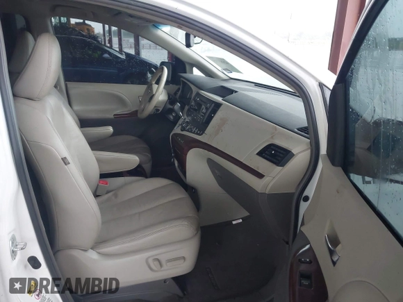 2012 Toyota Sienna XLE AAS with VIN 5TDYK3DC6CS228816, listed as a IAAI auction lot 42483715 with 206,925 mi miles and . Bid and sale history available at DreamBid. Image 5.