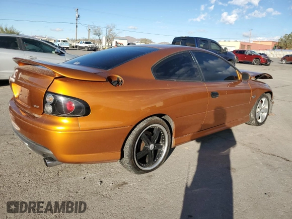 2006 Pontiac GTO z VIN 6G2VX12U26L832381, wystawiony jako Copart lot #79539604 z przebiegiem 116 157 mil mil oraz Szkoda całkowita • Salvage title. Historia ofert i sprzedaży dostępna na DreamBid. Obrazek 3.