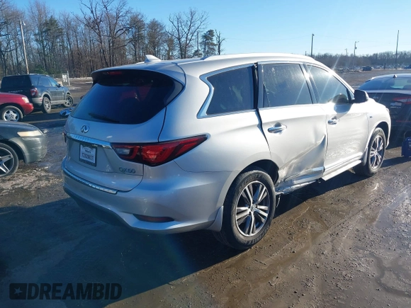 2019 Infiniti QX60 LUXE with VIN 5N1DL0MN3KC568514, listed as a IAAI auction lot 41308997 with 96,807 mi miles. Bid and sale history available at carsss.com. Image 4.