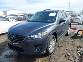 2016 Mazda CX-5 Touring with VIN JM3KE4CY9G0915305, listed as a IAAI auction lot 41840519 with 188,702 mi miles and . Bid and sale history available at carsss.com. Image 2.