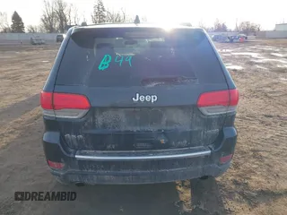 2014 Jeep Grand Cherokee Limited with VIN 1C4RJFBG4EC363411, listed as a IAAI auction lot 41822259 with 132,660 mi miles. Bid and sale history available at carsss.com. Image 16.