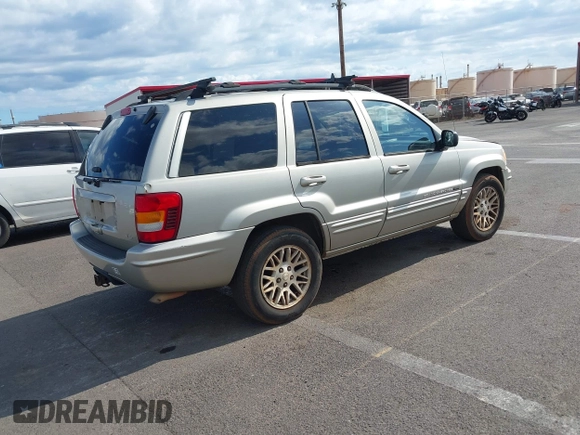 2004 Jeep Grand Cherokee Limited with VIN 1J4GW58N54C299669, listed as a IAAI auction lot 42369745 with 90,240 mi miles and . Bid and sale history available at DreamBid. Image 4.