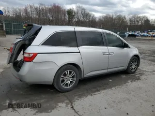 2011 Honda Odyssey EX-L with VIN 5FNRL5H63BB098661, listed as a Copart auction lot 52566345 with 177,071 mi miles and Salvage Title. Bid and sale history available at DreamBid. Image 3.