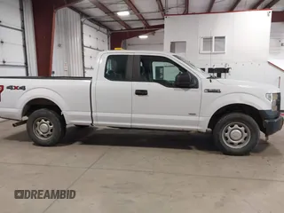 2015 Ford F-150 XLT with VIN 1FTEX1EP6FKE21697, listed as a IAAI auction lot 41960136 with 199,653 mi miles. Bid and sale history available at carsss.com. Image 13.