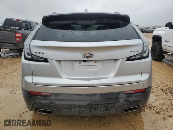 2022 Cadillac XT4 FWD Sport with VIN 1GYFZER47NF111047, listed as a Copart auction lot 50958135 with 14,448 mi miles and Salvage Title. Bid and sale history available at carsss.com. Image 6.