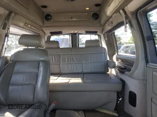 2004 Chevrolet Express Passenger z VIN 1GBFG15T841212230, wystawiony jako Copart lot #61109634 z przebiegiem 154 493 mil mil oraz Szkoda całkowita • Salvage title. Historia ofert i sprzedaży dostępna na DreamBid. Obrazek 10.